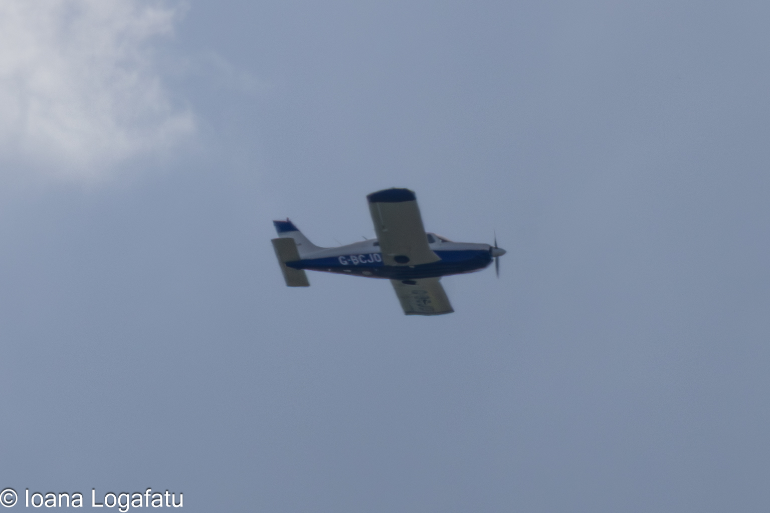 Soaring skies with a small aircraft in flight